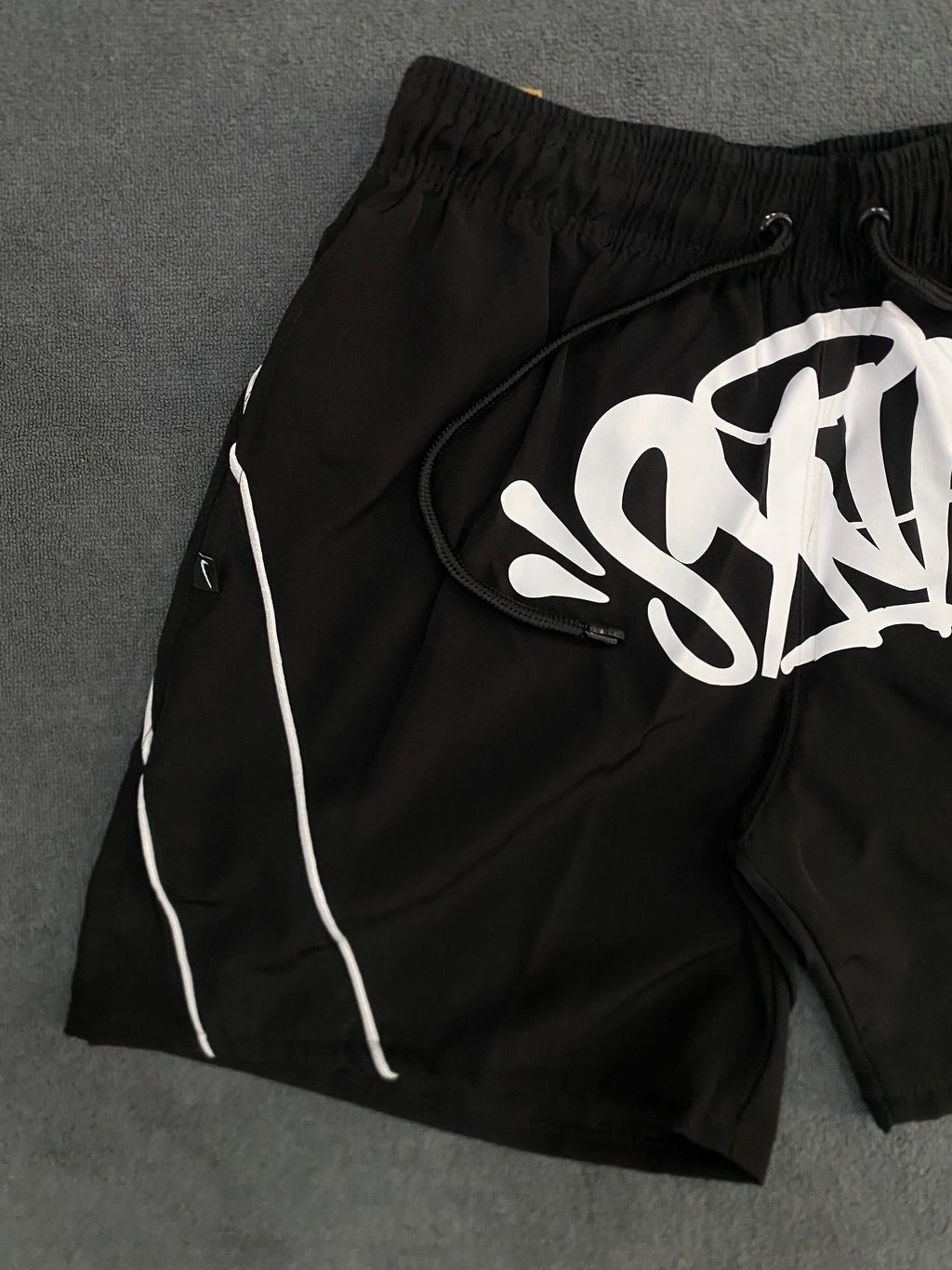 BERMUDA SHORT LOGO SYNA WORLD