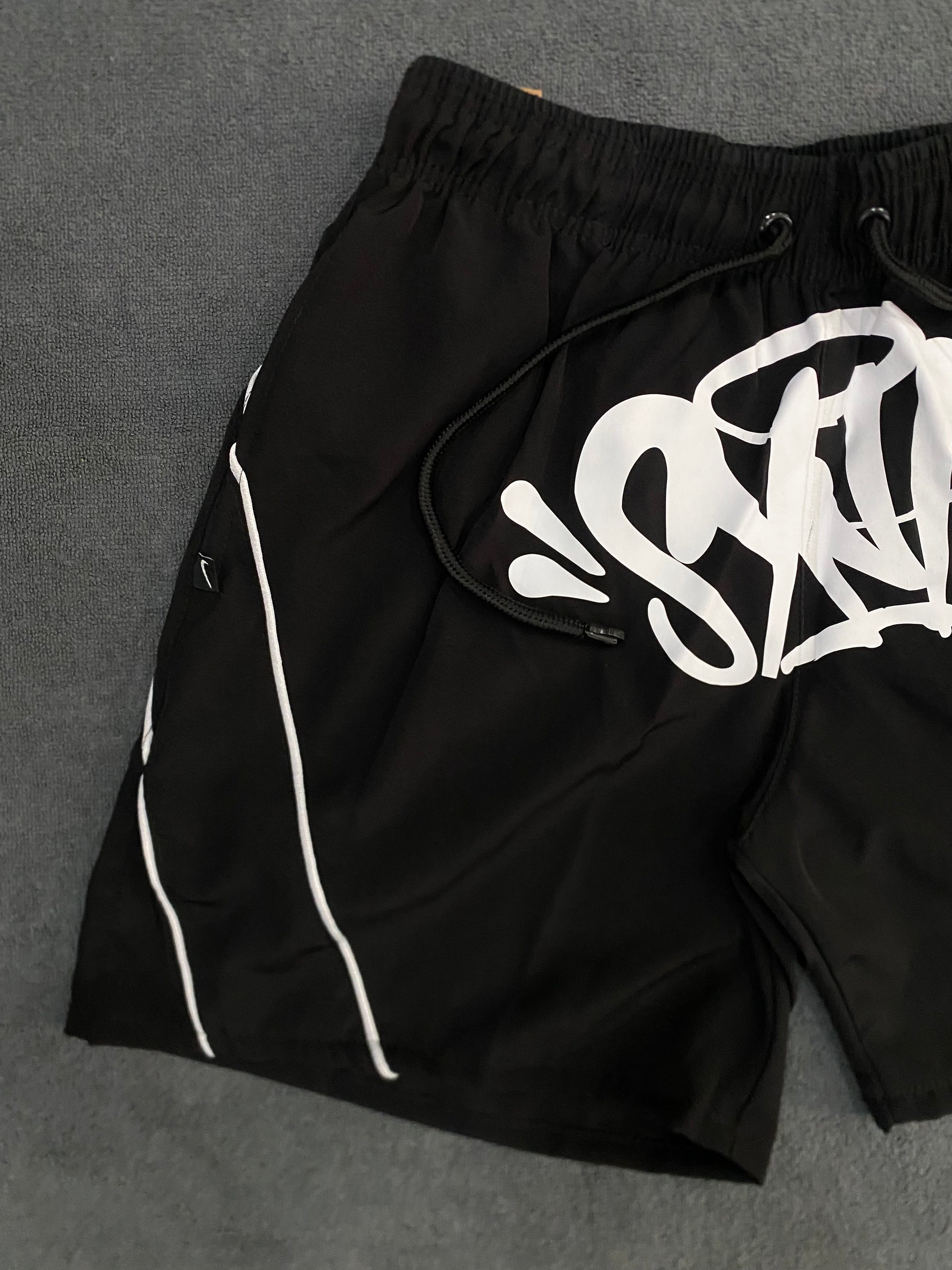 BERMUDA SHORT LOGO SYNA WORLD
