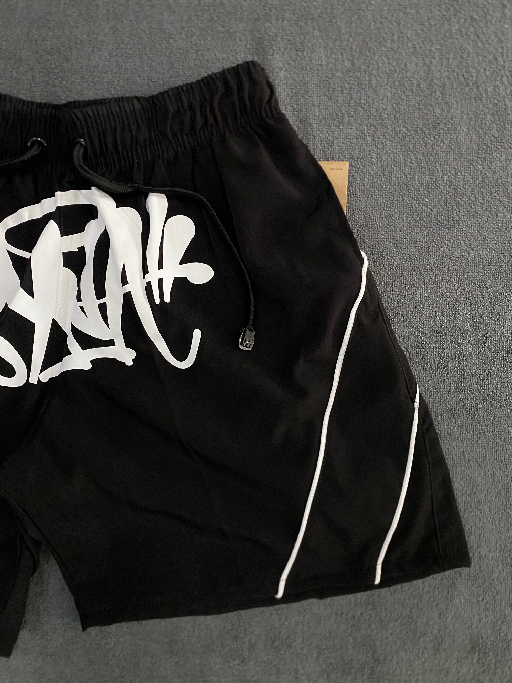 BERMUDA SHORT LOGO SYNA WORLD