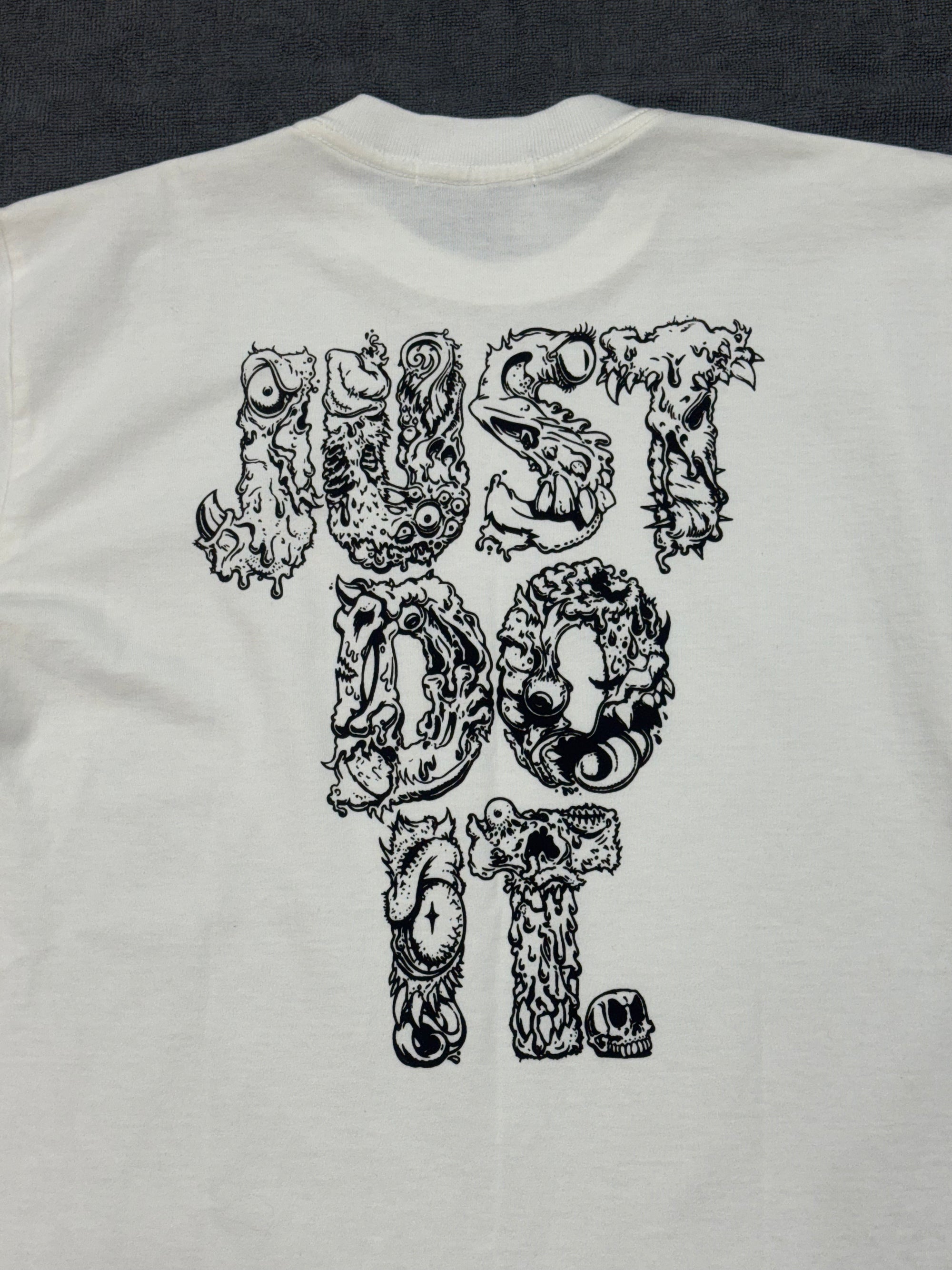 CAMISETA OVERSIZED NK JUST DO IT - BRANCA